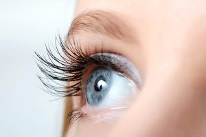 Woman with Blue Eye Looking Into Camera 