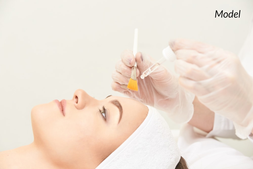 A woman during her chemical peel treatment.