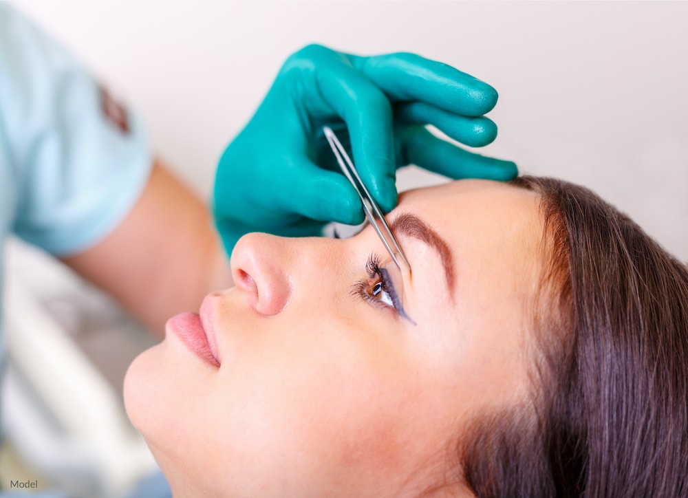 Women undergoing an eyelid surgery consultation to determine her candidacy.