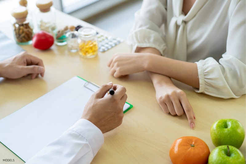 Woman sitting at a nutrition consultation